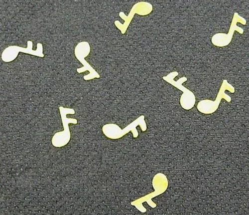 Photo du produit Confettis de table forme note de musique dorés 10 gr