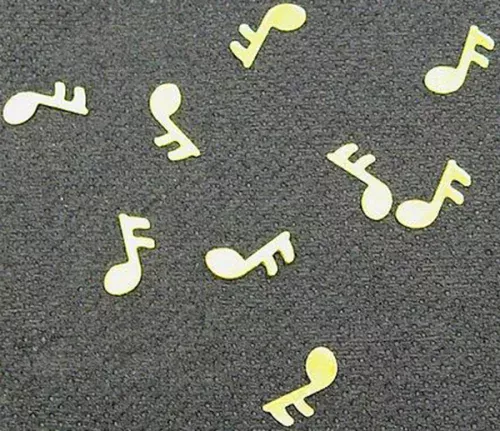 Photo du produit Confettis de table forme note de musique dorés 10 gr